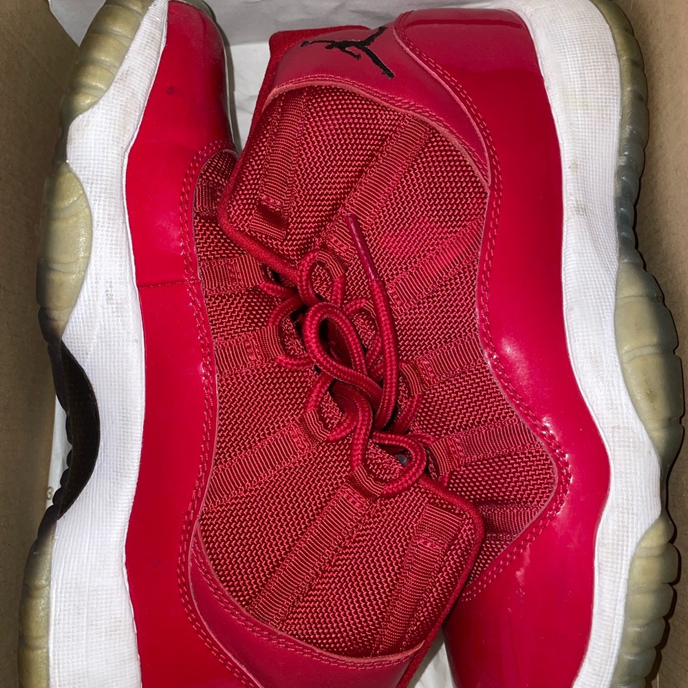 Air Jordan 11s (gym red)